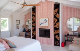 Luxury Villa Benedetta in Sardinia for Rent | Bedroom with fireplace