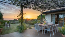 Luxury Casa del Vento in Tuscany for Rent - terrace with table in sunset
