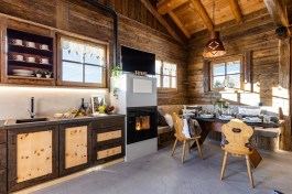 Luxury Chalet Lusia in Dolomites for Rent | Living room and kitchen