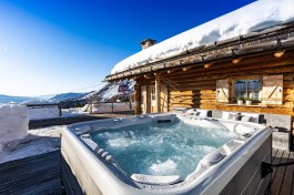 Luxury Chalet Lusia in Dolomites for Rent | Chalet on the ski slope with jacuzzi