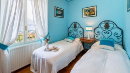 Luxury Villa La Dolce in Santa Maria Rezzonico for Rent | Bedroom