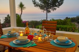 Villa Desirée in Sicily for Rent | Sunset on terrace with glas of vine