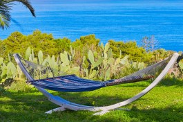 Villa Gaia Scopello in Sicily for Rent | Hammock in the garden with sea view