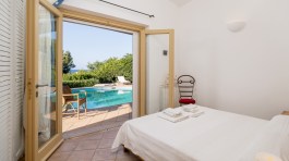 Luxury Villa Li Baietti in Sardinia for Rent | Bedroom with entrance on terrace