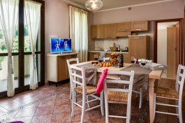 Apartment in Villetta Dino in Tuscany for Rent | Kitchen and Living Room with Table