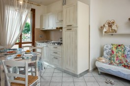 Apartment in Villetta Tina in Tuscany for Rent | Kitchen and Sofabed in Living Room